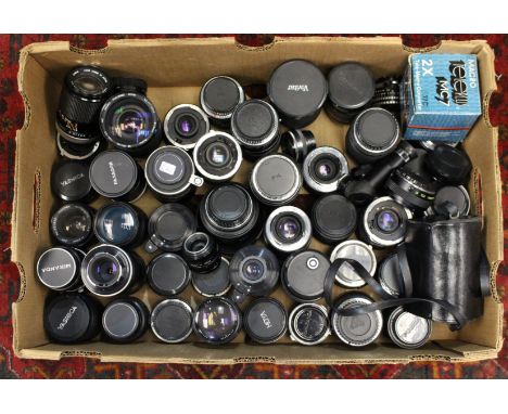 Lenses: One box of assorted camera lenses to include examples of: Canon, Vivitar, Sigma, Miranda, Fujica and many others, wit