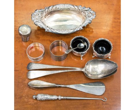 A pair of London 1810, George III, table spoons, approx 3.82ozt, two napkin rings, approx 1.60ozt, a pair of 1923 salts and l