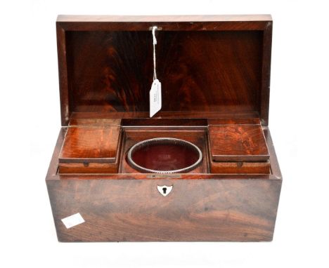 A George III mahogany tea caddy, sarcophagus form, two removable caddies to the interior and central glass bowl 