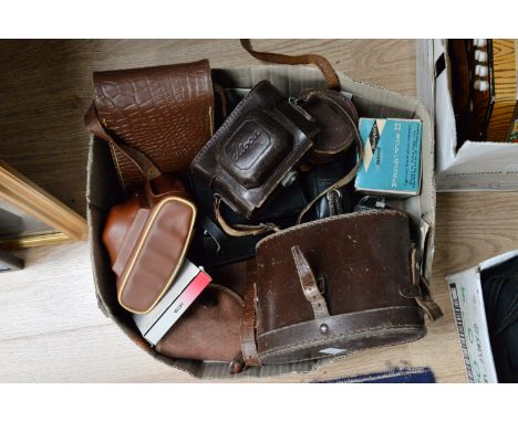 A box of cameras and binoculars, most cased, with camera parts etc 