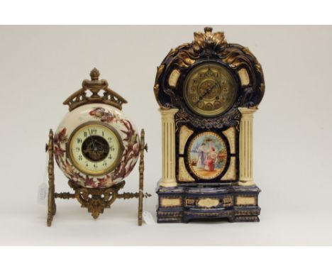 Two ceramic time pieces: one having ormolu frame and majolica Scottish theme, enamel dial and Arabic numerals; the other bein