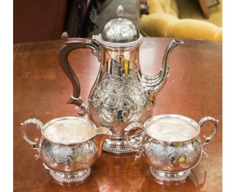 A collection of silver plate including  a Victoria style coffee pot, sugar bowl and cream jug with various flatware including