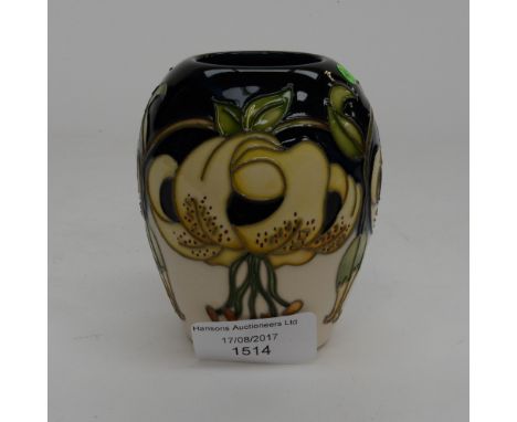 A Moorcroft vase in the Trig pattern, 1st quality, yellow tiger lillies on cream ground rising to black, designed by Rachel B