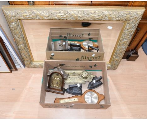 A brass inkwell set, two silversters patent irons, a modern mantle clock, barometer and a gilt framed mirror with bevelled gl