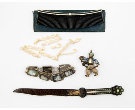 An Anglo Indian hardstone and mother of pearl set paper knife; together with mother of pearl and silver carved bracelet, an i