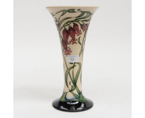 A Moorcroft vase in the Imogen pattern, 1st quality, in unusual colourway, having red Bluebells on cream ground, designed by 