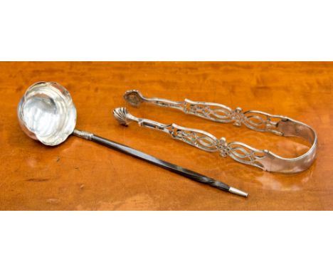 A pair of mid 18th Century cast silver sugar tongs, fret decorated circa 1745; together with a whale bone handled toddy ladle