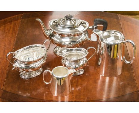 A silver plated three piece tea service and milk jug and hot water jug (5)