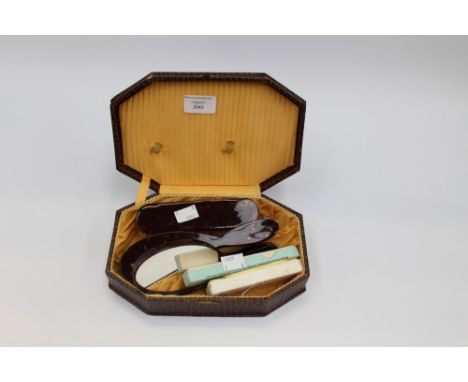 A cased Waterman 'Flair Petite' pen with a 'The Unique Pen' having 14ct gold nib and a cased Bakelite brush and mirror set (3