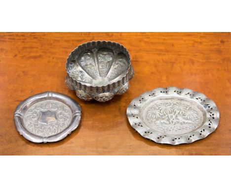 Two white metal trinket dishes, with a white metal bowl, all items are embossed, possibly Indian silver total weight approxim