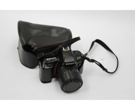 A Nikon F70 SLR camera, cased, working order