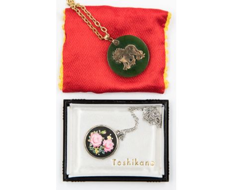 A spinach jade pendant (Chinese) with 14k gold Lion motif and clasp, the chain is gilt metal; together with a Toshikane penda