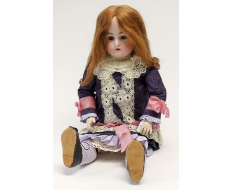 Kammer & Reinhardt: A Kammer & Reinhardt bisque head doll, marked to head 'S & H, K *& R, 73', the bisque head having no obvi