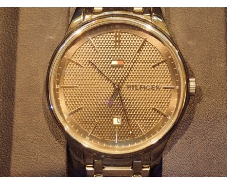 Gents Tommy Hilfiger wristwatch CONDITION REPORT: This item is working at lotting.