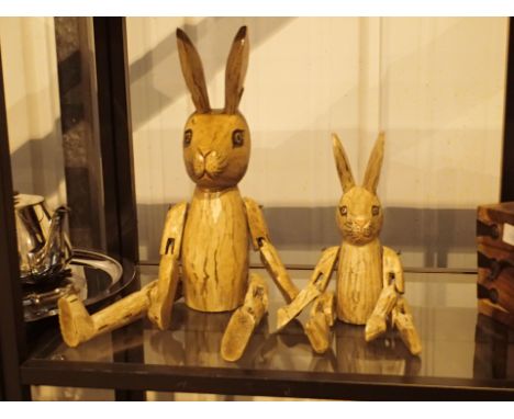 Two wooden shelf rabbits