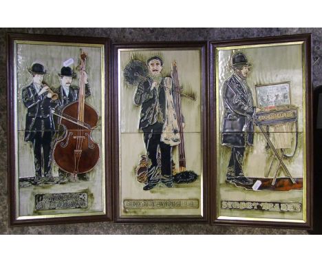 Three framed tiled plaques: with street musicians, chimney sweep and street trader. 