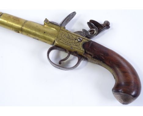 An 18th century brass barrel flintlock pistol, by R Clarke of Cheapside London, with walnut stock, overall length 25cm