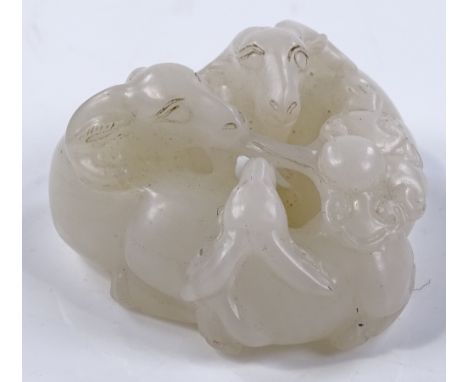 A Chinese white jade carving in the form of 3 rams, length 5cm