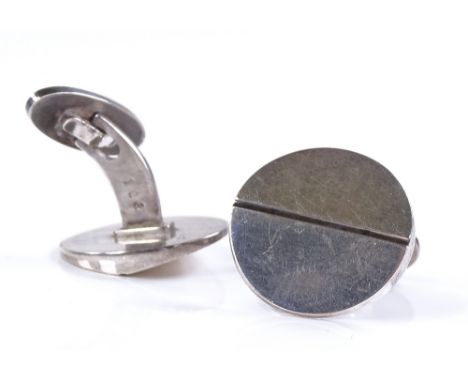 A pair of Georg Jensen Danish sterling silver cufflinks, of plain circular form, model no. 106, panel diameter 21mm, 20.8g to