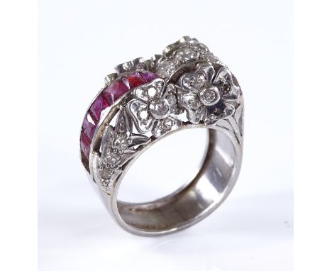 A fine ruby and diamond cluster cocktail ring, with diamond set flowerheads and line of rectangular rubies, settings unmarked