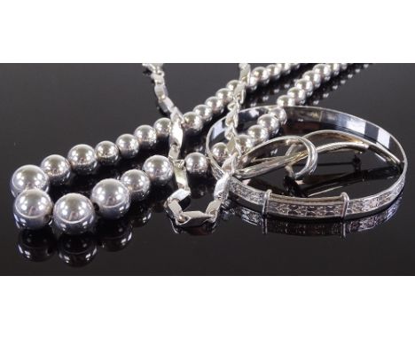 An Italian silver bobble design necklace, a silver fancy link necklace, a silver bangle and a silver brooch, 62.1g total, (4)