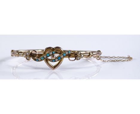 A Victorian 9ct gold turquoise and pearl hinged bangle, with heart and leaf design, internal diameter 59.7mm, 4.8g