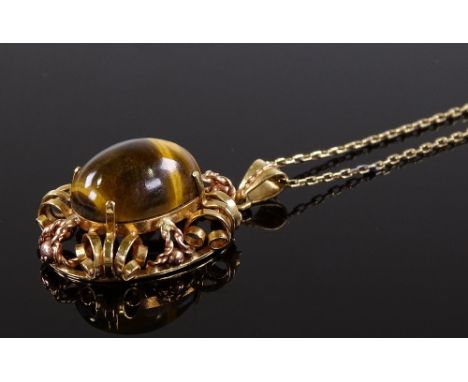 An Austrian 14ct gold cabochon tiger's eye pendant, on 14ct gold chain, pendant height 28.6mm, chain length 490mm