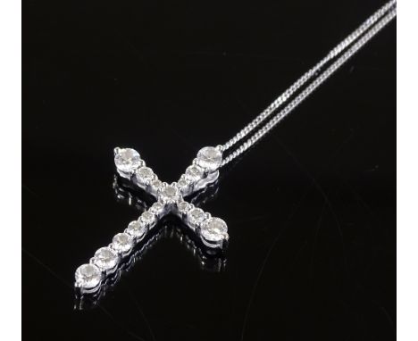 A 9ct white gold diamond set cross pendant, on 9ct chain, pendant height 24.4mm, chain length 460mm, 1.9g