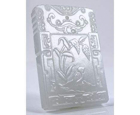 A Chinese relief carved white jade pendant with text, height 5cm
