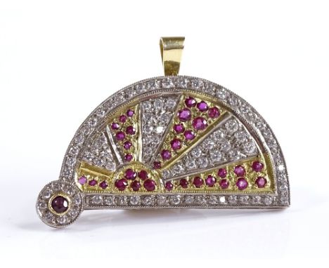 An 18ct gold and platinum ruby and diamond set sunrise / sunset brooch / pendant, encrusted with pave set rubies and diamonds