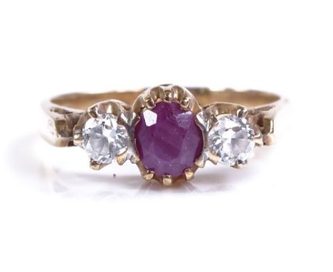 A 9ct gold 3-stone ruby and diamond ring, with central faceted rough ruby, setting height 7.6mm, size S, 3.8g