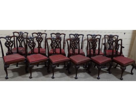 A set of 12 19th century mahogany Chippendale design dining chairs (10 + 2), with carved and pierced backs, drop-in seats and