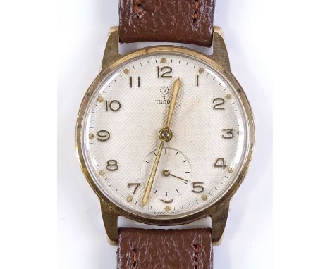 A 9ct gold Tudor Rolex wristwatch, gold Arabic numerals with subsidiary seconds dial and 15 ruby movement, case no. 567665, c