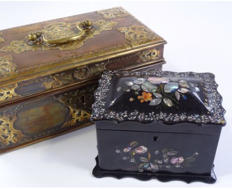 An ornate Middle Eastern copper and brass casket, width 28cm, and a Victorian papier mache and mother-of-pearl inlaid dome-to