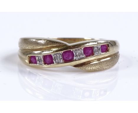 A 9ct gold ruby and diamond half hoop ring, setting height 5.8mm, size M, 2.9g