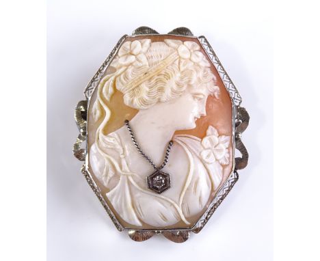 A Victorian relief carved cameo brooch / pendant, depicting a female portrait bust, in 14ct white frame and diamond set neckl