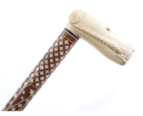 An Indian floral ivory marquetry inlaid walking stick, with ivory dog's head handle