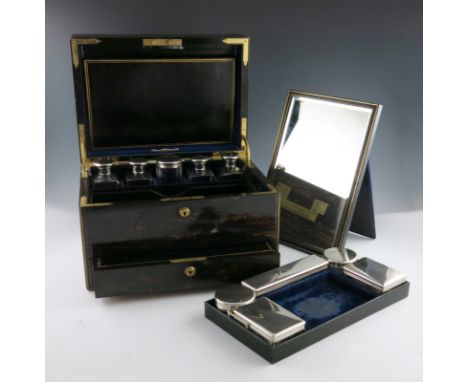 A Victorian silver-mounted travelling dressing table set, by Frederic Purnell, London 1881, plain covers, comprising: three r