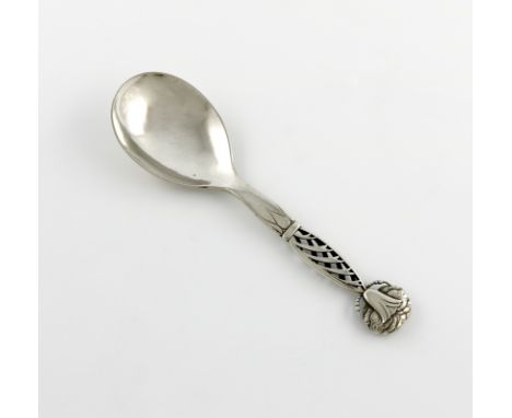 By Georg Jensen, a Danish silver serving spoon, design no. 83, assay mark for 1927, assay master C. F. Heise, the handle with