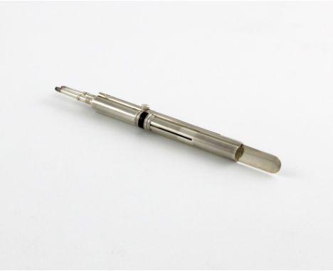 A Victorian silver and enamel two colour pencil / paper knife, by Sampson Mordan and Co, circa 1890, fluted oval form, with r
