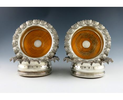 A set of four William IV silver wine coasters, by Edward, Edward, John & William Barnard, London 1834, circular form, with em