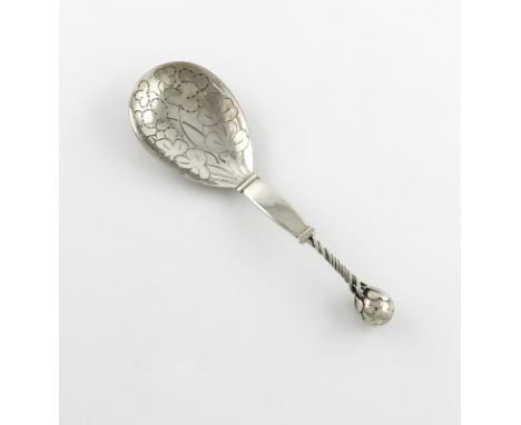 By Georg Jensen, a Danish silver serving spoon, design no. 35, assay date 1924, assay master C. F. Heise, with import marks f