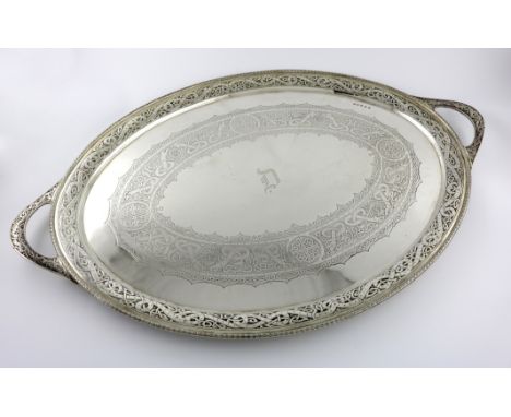 A Scottish silver two-handled tray, by R and W Sorley, Glasgow 1918, oval form, intertwined Celtic border and engraved decora