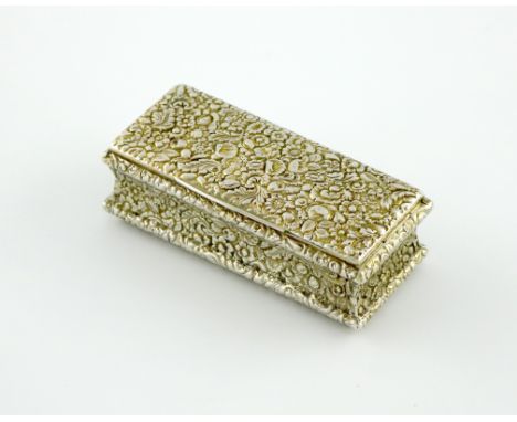 A 19th century continental silver-gilt snuff box, possibly Austro-Hungarian, circa 1850, rectangular form, chased foliate scr