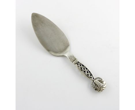 By Georg Jensen, a Danish silver serving slice, design no. 83, circa 1915-27, the handle with pierced decoration, and with a 
