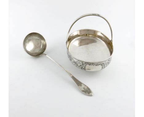A Russian silver swing-handled basket, maker's mark BTC, 1896-1908, oval form, the swing-handle repaired, the body with engra