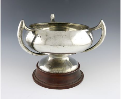 A Scottish silver three-handled bowl, by W and R Sorley, Glasgow 1919, circular form, with three scroll handles, on a raised 