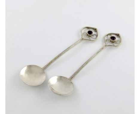 By A. E Bonner, a pair of Edwardian Arts and Crafts silver spoons, London 1909, circular bowls, spot-hammered decoration ribb