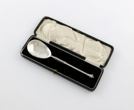 By George Hunt, an Arts and Crafts silver spoon, Birmingham 1928, slender fig shaped bowl, spot-hammered decoration, the face