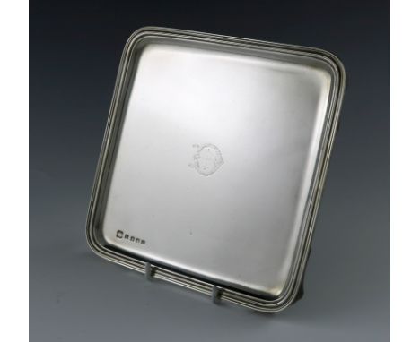 A Scottish silver waiter, by R and W Sorley, Glasgow 1917, square form, moulded border, initialled, on four bracket feet, len
